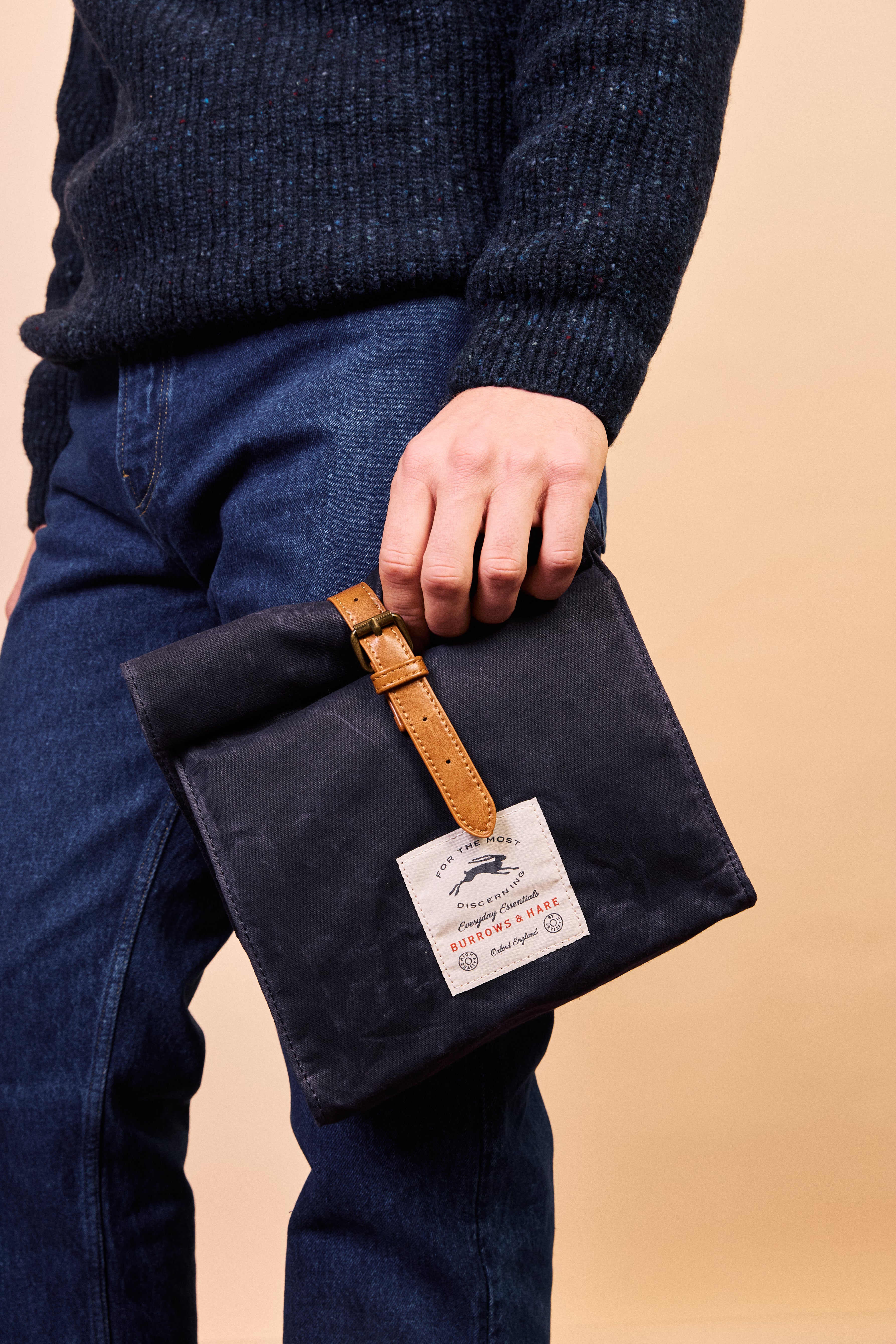 Navy thermal lunch bag opened to show capacity