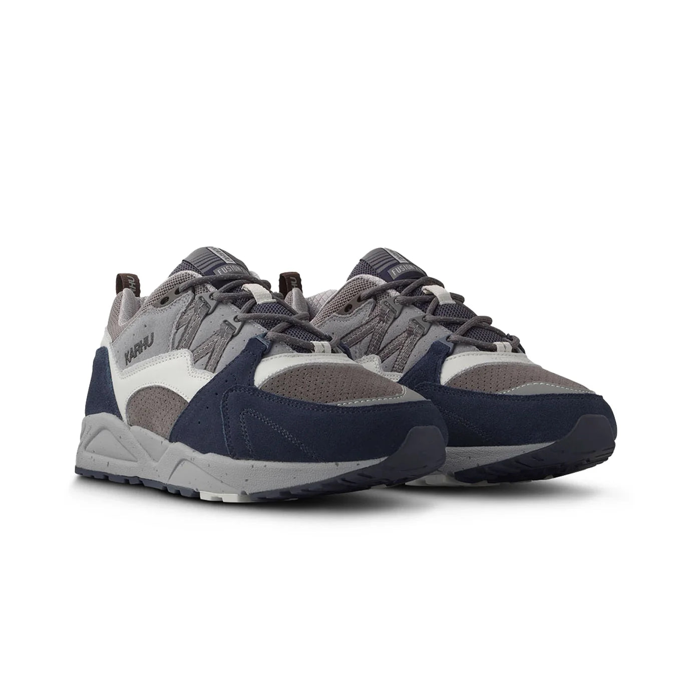 Side profile of Karhu Fusion 2.0 trainers showcasing the M-logo and reflective details.