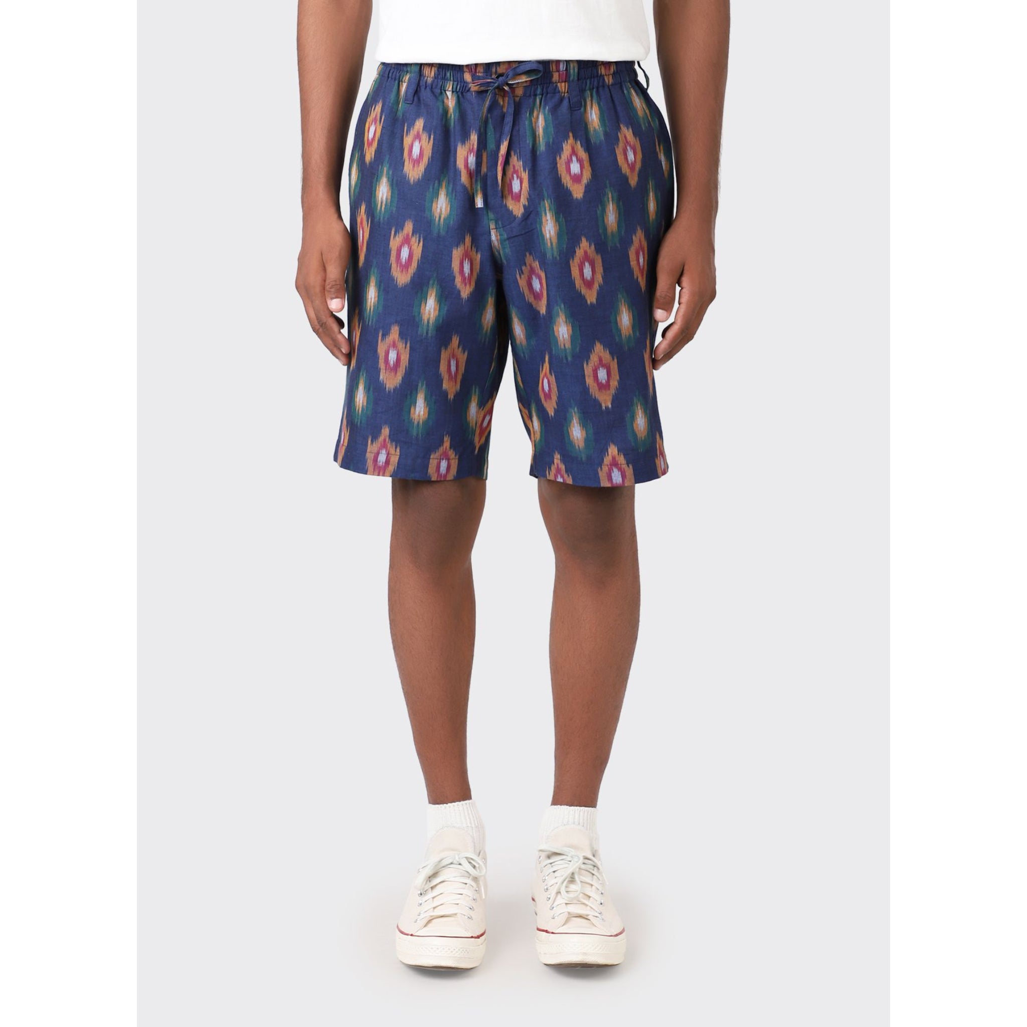 Kardo's Sid Drawstring Shorts, handcrafted in New Delhi, shown in a stylish casual setting.