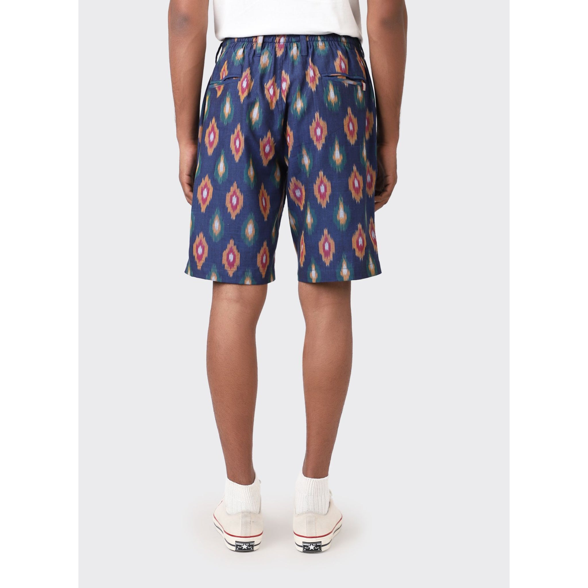 Detailed view of Kardo's Sid Drawstring Shorts showcasing the Ikat navy geometric pattern.