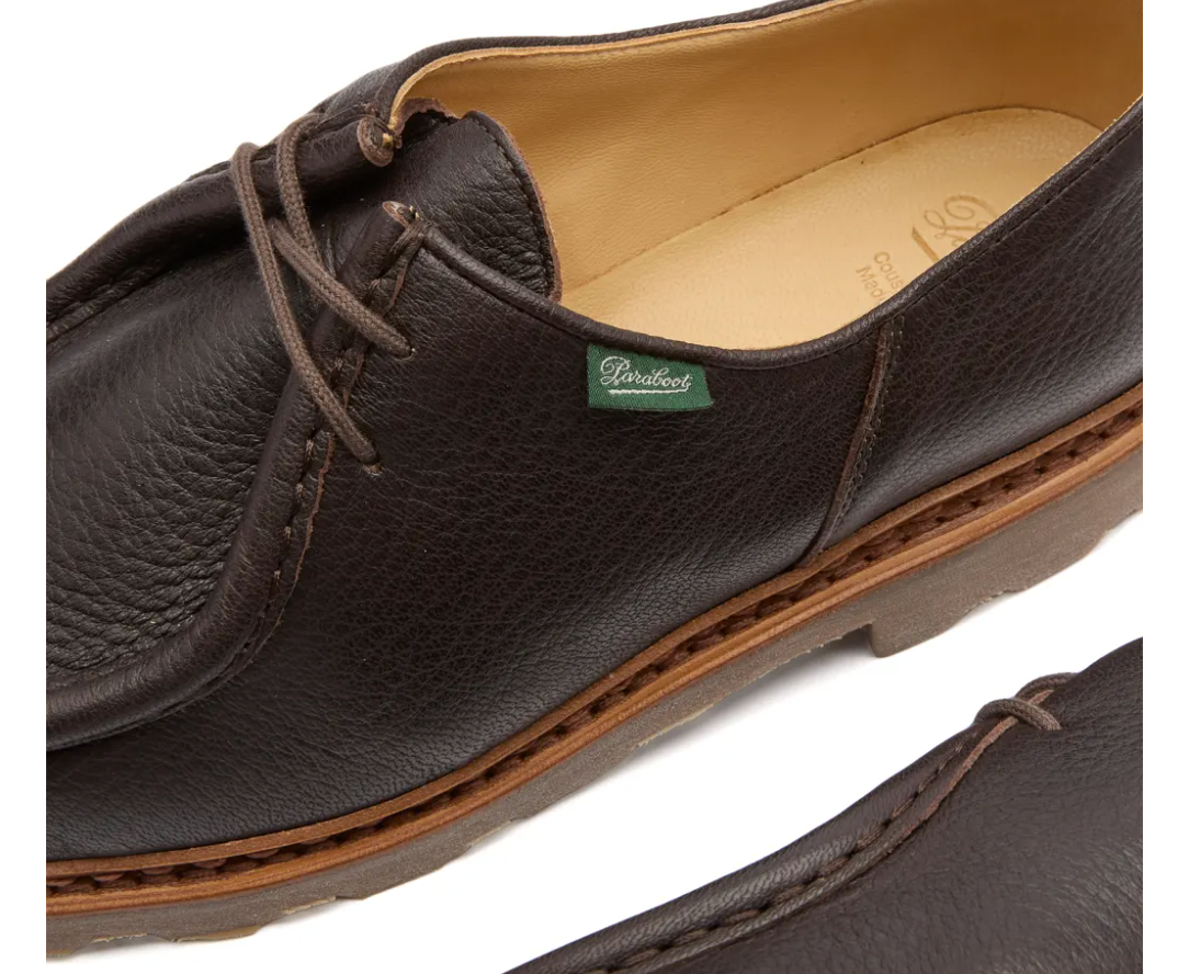 Close-up view of the moccasin toe and Norwegian welt stitching on Michael Marche Noix Cerf Marron shoes.
