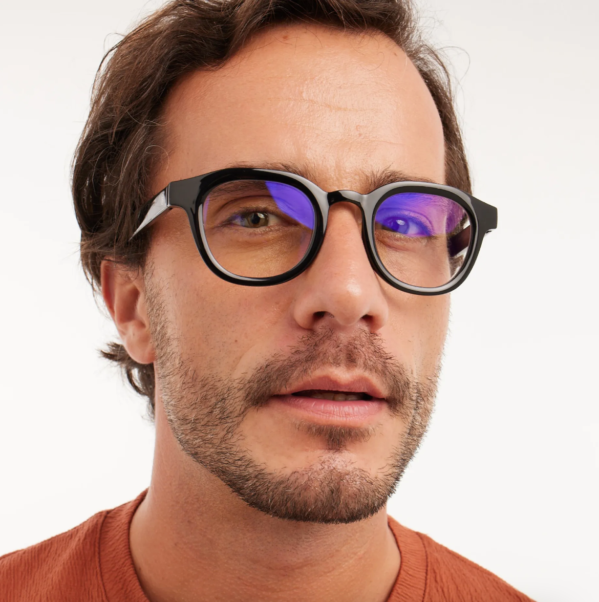 Wearer view of Barner’s black Andy Glossy sunglasses, displaying glossy finish.